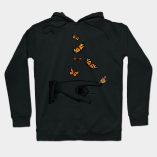 hand with orange monarch butterfly Hoodie